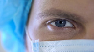 Closeup Image of Doctor's Eyes in a Surgical Mask