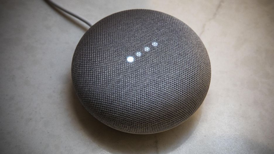 A gray Google Home Mini