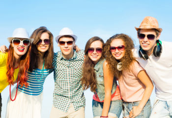 Group of people all wearing sunglasses