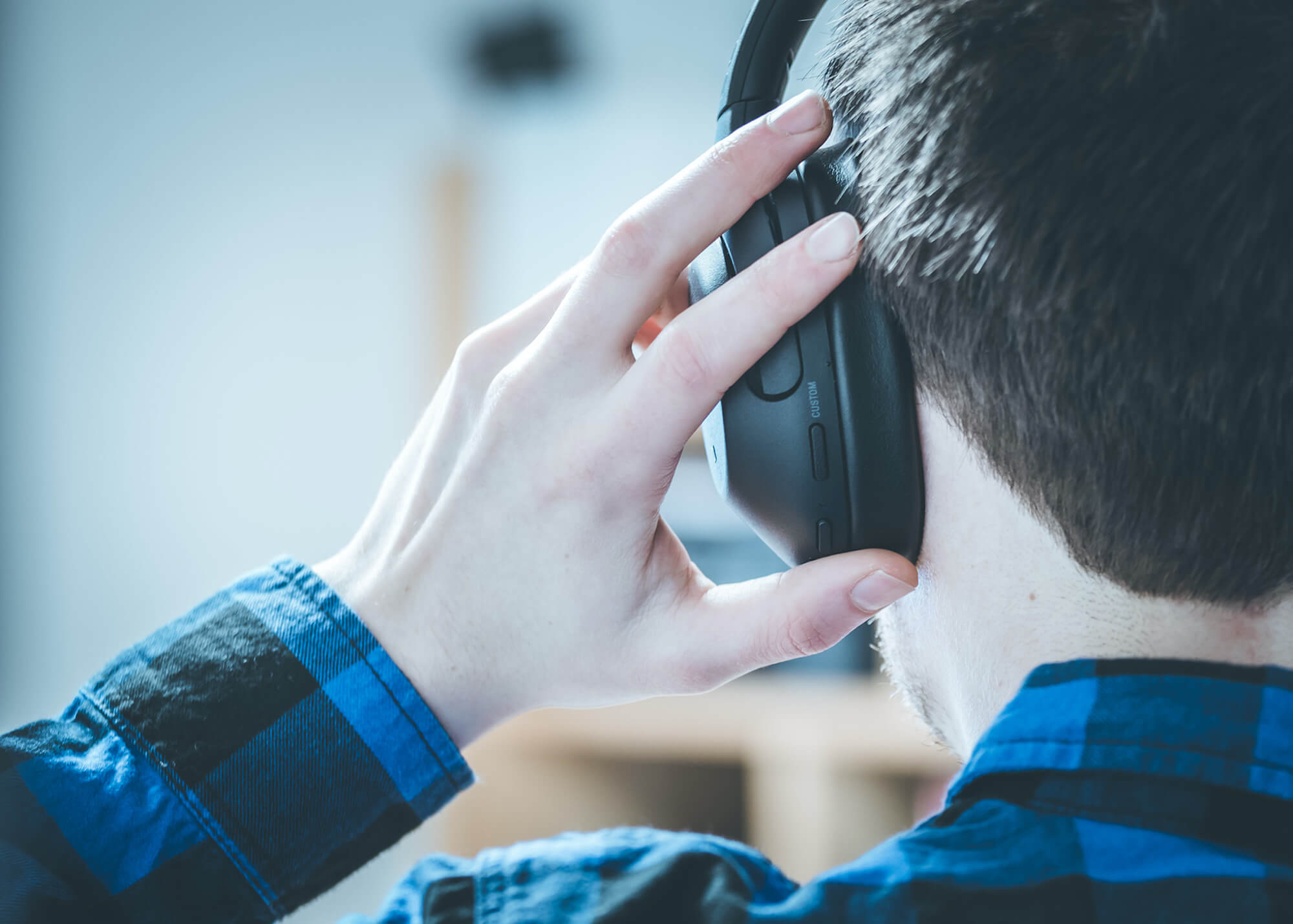 Man Listening With Headphones