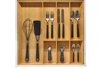 Image of cooking tools and utensils neatly organized in a kitchen drawer.