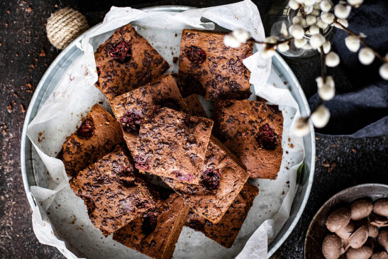Image shows plate of delicious freshly baked brownies.