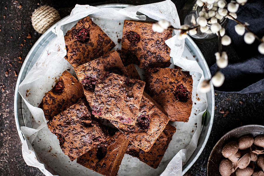 Image shows plate of delicious freshly baked brownies.