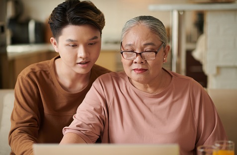 Mature woman working with vision rehab therapist.