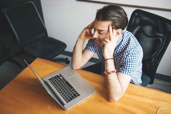 Guy stressed with tech issues