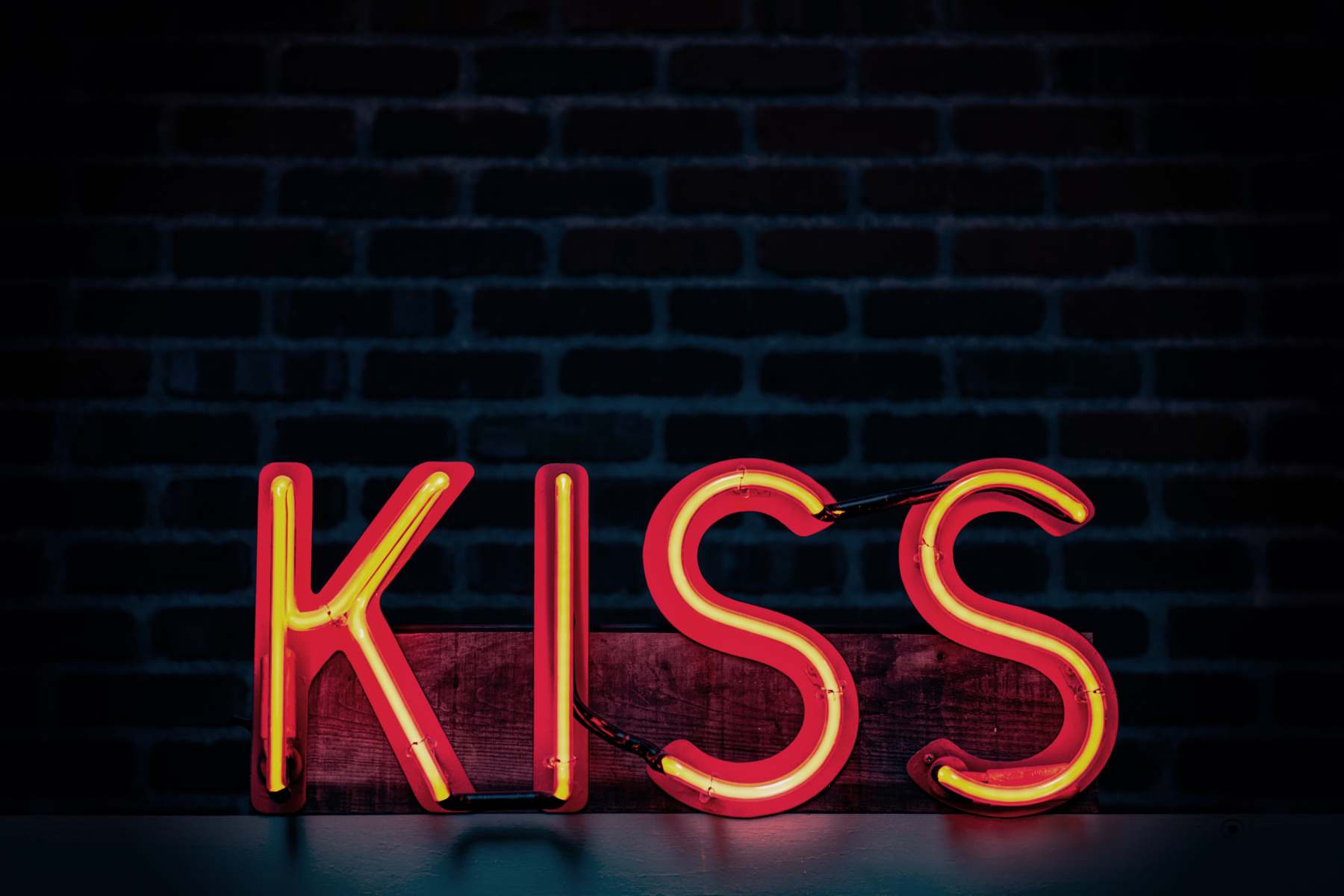 Neon sign spells: KISS